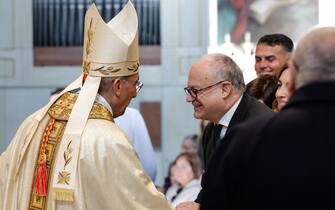 Cardinal Baldassarre Reina and Mayor of Rome Roberto Gualtieri during a Holy Mass for the open the Holy Door in St Giovanni's Basilica, in Rome, Italy, 29 December 2024. ANSA/GIUSEPPE LAMI