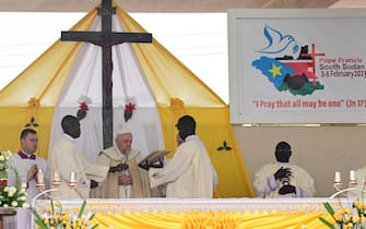 Pope Francis (3rd L) presides over the holy mass at the John Garang Mausoleum in Juba, South Sudan, on February 5, 2023. - Pope Francis wraps up his pilgrimage to South Sudan with an open-air mass on February 5, 2023 after urging its leaders to focus on bringing peace to the fragile country torn apart by violence and poverty.
The three-day trip is the first papal visit to the largely Christian country since it achieved independence from Sudan in 2011 and plunged into a civil war that killed nearly 400,000 people. (Photo by Tiziana FABI / AFP) (Photo by TIZIANA FABI/AFP via Getty Images)