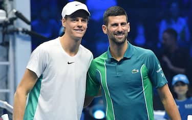 Novak Djokovic of Serbia and Jannik Sinner of Italy at the Nitto ATP Finals tennis tournament in Turin, Italy, 19 November 2023. ANSA/ALESSANDRO DI MARCO