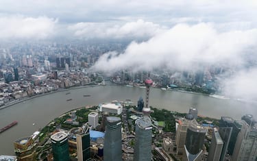 View from the Shanghai tower observation deck across the Haungpu River to Shanghai, Pudong, China