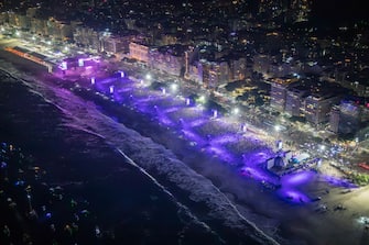 RIO DE JANEIRO, BRAZIL - MAY 04: (EDITORâ  S NOTE:Â This Handout image/clip was provided by a third-party organization and may not adhere to Getty Imagesâ   editorial policy.) In this handout image, aerial view of Copacabana Beach packed by concertgoers during Madonna's massive free show to close "The Celebration Tour" on May 04, 2024 in Rio de Janeiro, Brazil. (Photo by Fernando Maia/Riotur via Getty Images)