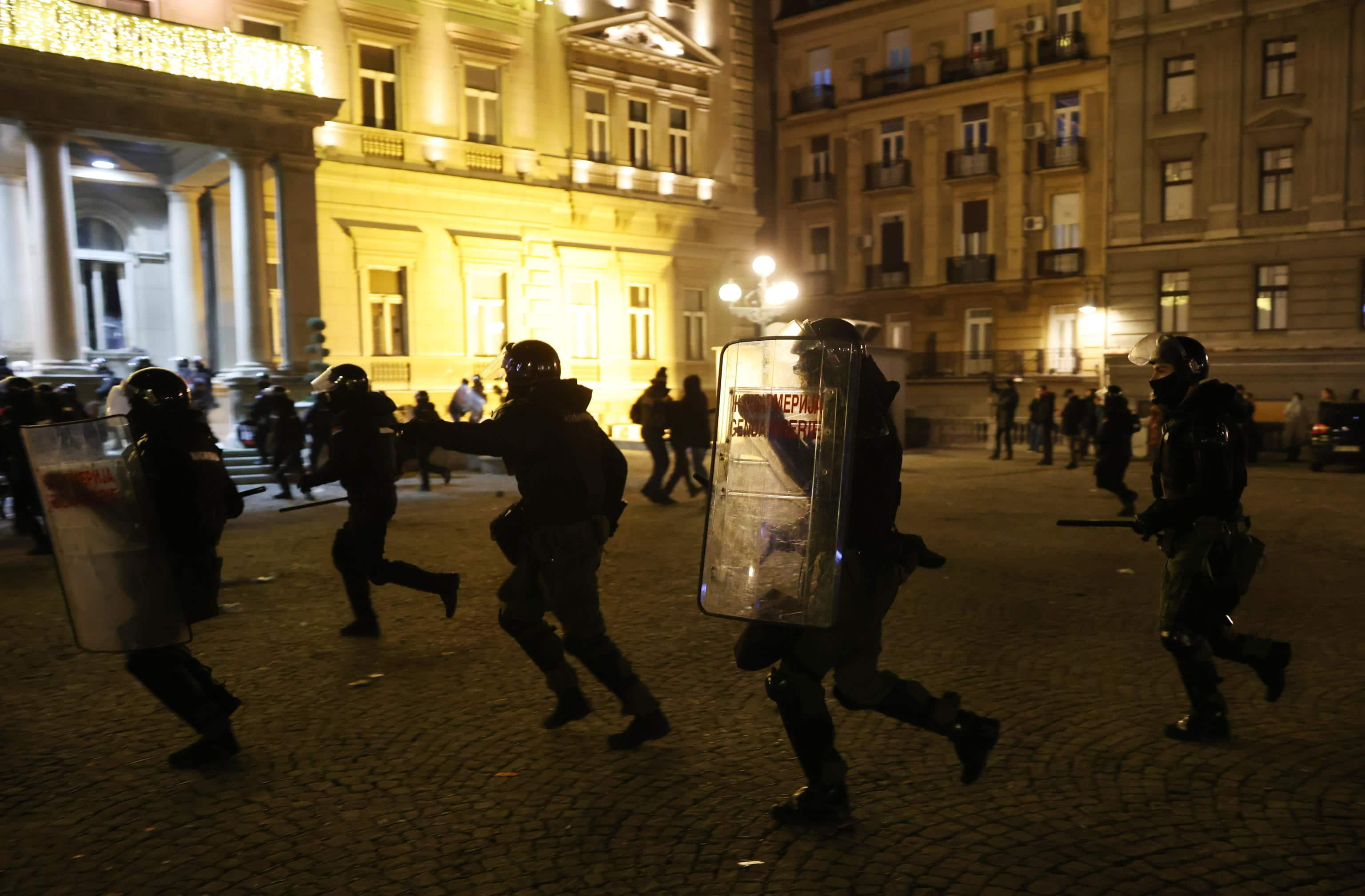 epaselect epa11043413 Anti-riot police officers take position as opposition supporters try to storm the office of Belgrade mayor in Belgrade, Serbia, 24 December 2023. Early official vote count after the parliamentary and local elections on 17 December 2023 confirmed that the Serbian Progressive Party (SNS) had won the election in Serbia and secured a majority in the Parliament. Tensions grew high after the opposition reported irregularities in the capital Belgrade and called their supporters to protest in front of the Electoral commission.  EPA/ANDREJ CUKIC