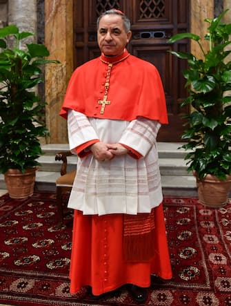 Newly elevated cardinal, Giovanni Angelo Becciu from Italy, attends the courtesy visit of relatives following a consistory for the creation of new cardinals on June 28, 2018 in the Apostolic Palace at St Peter's basilica in Vatican. (Photo by ANDREAS SOLARO / AFP) (Photo by ANDREAS SOLARO/AFP via Getty Images)