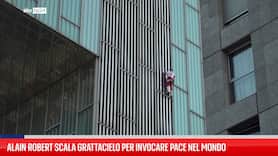 Alain Robert scala grattacielo per invocare pace nel mondo