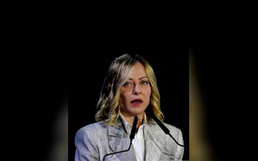 epa11825985 Italian Prime Minister Giorgia Meloni delivers a speech during the Abu Dhabi Sustainability Week (ADSW) as part of the World Future Energy Summit 2024 (WFES) in Abu Dhabi, United Arab Emirates, 15 January 2025. The ADSW runs until 18 January 2025. On the sidelines of the Sustainability Week summit in Abu Dhabi, the Albanian prime minister said an agreement will be signed by Italy, Albania, and the United Arab Emirates on submarine cables.  EPA/ALI HAIDER