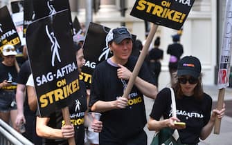 Mandatory Credit: Photo by Erik Pendzich/Shutterstock (14009949ah)
Paul Dano joins members of the Writers Guild of America and the Screen Actors Guild as they walk a picket line outside of Warner Bros Discovery, Inc on July 14, 2023 in New York City.
SAG-AFTRA Strike Picket Line, New York, USA - 14 Jul 2023