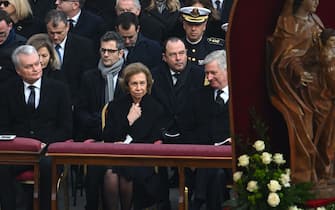 Former Queen Sofia of Spain (C) and King Philippe of Belgium (R) attend the funeral mass of Pope Emeritus Benedict XVI at St. Peter's square in the Vatican, on January 5, 2023. - Pope Francis will preside on January 5 over the funeral of his predecessor Benedict XVI at the Vatican, an unprecedented event in modern times expected to draw tens of thousands of people. (Photo by Filippo MONTEFORTE / AFP) (Photo by FILIPPO MONTEFORTE/AFP via Getty Images)
