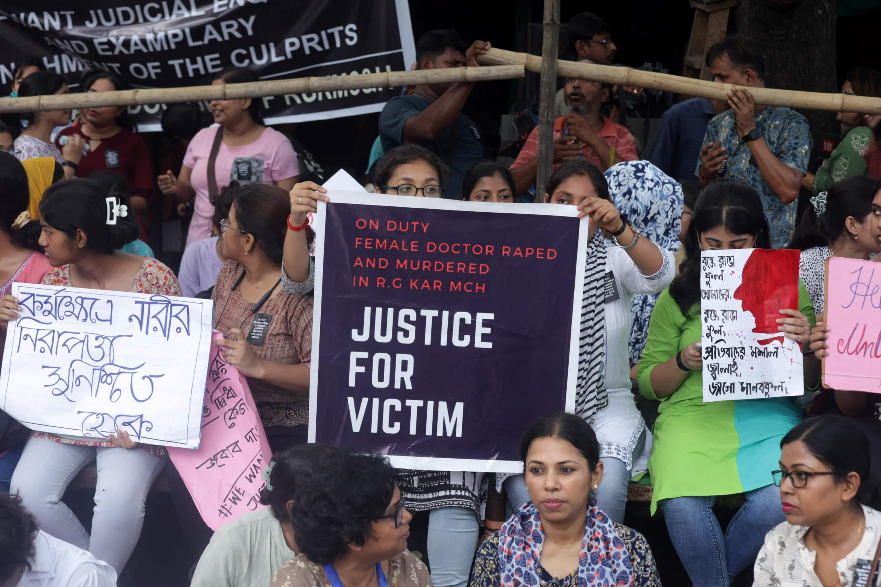 epa11546645 Medical students and doctors attend a protest against an alleged rape and murder incident at RG Kar medical college in Kolkata, India, 12 August 2024. Medical students and doctors boycotted work at Government Medical College and Hospital and joined a state-wide protest over an alleged rape and murder of a doctor during her working hour in RG Kar medical college. A postgraduate student was found dead at a seminar hall of the hospital on 09 August, while the police arrested a man in connection with the investigation into the incident.  EPA/PIYAL ADHIKARY