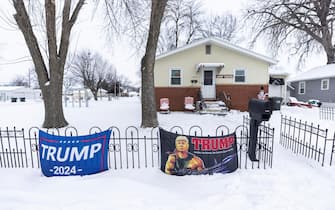 epa11070417 Signs promoting Donald Trump for president are displayed in a front yard in Fort Dodge, Iowa, USA, 11 January 2024. Former President Donald Trump, former South Carolina Governor Nikki Haley, and Florida Governor Ron DeSantis are criss-crossing the state in the final days before its first-in-the-nation caucus on 15 January. The state is expecting more snowfall and temperatures as low as minus 17 degrees Fahrenheit (minus 27 degrees Celsius) in the days before the caucus.  EPA/JIM LO SCALZO