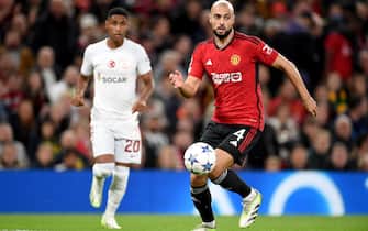 epa10898118 Sofyan Amrabat of Manchester United in action during the UEFA Champions League Group A match between Manchester United and Galatasaray Istanbul in Manchester, Britain, 03 October 2023.  EPA/PETER POWELL