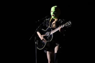 RIO DE JANEIRO, BRAZIL - MAY 03: Singer Madonna wears a mask during a rehearsal on stage at Copacabana Beach on May 3, 2024 in Rio de Janeiro, Brazil. (Photo by Wagner Meier/Getty Images)