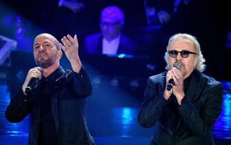Italian singers Raf (L) and Umberto Tozzi (R) perform on stage at the Ariston theatre during the 69th Sanremo Italian Song Festival, Sanremo, Italy, 07 February 2019. The Festival runs from 05 to 09 February. ANSA/ETTORE FERRARI
