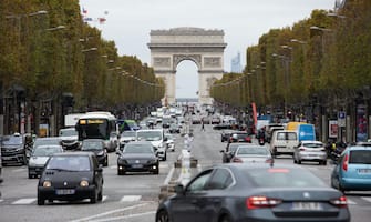 People drive their cars on the avenue des Champs-Elysee leading to the Arch of Triumph in Paris, France on October 30, 2020. The traffic looks almost as usual despite a second lockdown came into force at midnight on Friday (23:00 GMT) to tackle spiralling Covid infections. People have been ordered to stay at home except for essential work or medical reasons. President Emmanuel Macron said the country risked being "overwhelmed by a second wave that no doubt will be harder than the first". Photo by Raphael Lafargue/ABACAPRESS.COM