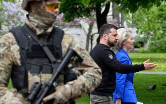 Ukrainian President Volodymyr Zelensky (C) and President of the European Commission Ursula von der Leyen (R) walk after their talks in Kyiv on May 9, 2023. European Commission President Ursula von der Leyen arrived in Kiev on May 9, 2023, to mark Europe Day and show her support for Ukraine in the face of the Russian offensive, on the day Moscow commemorates the victory over Nazi Germany. (Photo by Sergei SUPINSKY / AFP) (Photo by SERGEI SUPINSKY/AFP via Getty Images)