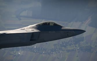 LASK, POLAND - OCTOBER 12 : A Raftor F22 from US Air Force, F 16 fighter jets and MIG 29 of the Polish Air Force take part in a NATO Air Force military drill on October 12, 2022 in Lask, Poland. (Photo by Stringer/Anadolu Agency via Getty Images)