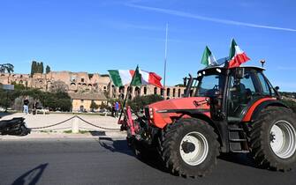 Farmers gather at Circo Massimo during a protest to ask for better working conditions on February 15, 2024. Farmers staged demonstrations for weeks all around Italy to demand lower fuel taxes, better prices for their products and an easing of EU environmental regulations that they say makes it more difficult to compete with cheaper foreign produce. (Photo by Tiziana FABI / AFP)