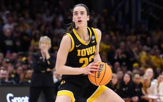 CLEVELAND, OHIO - APRIL 07: Caitlin Clark #22 of the Iowa Hawkeyes looks on in the first half during the 2024 NCAA Women's Basketball Tournament National Championship game against the South Carolina Gamecocks at Rocket Mortgage FieldHouse on April 07, 2024 in Cleveland, Ohio. (Photo by Gregory Shamus/Getty Images)