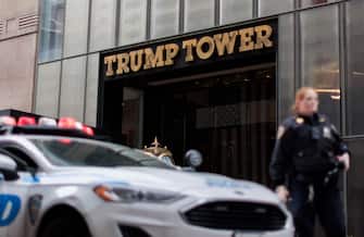 epa10554108 A police car in front of Trump Tower in New York, New York, USA, 01 April 2023. Former President Donald J. Trump is reportedly set to return to New York next week and is scheduled to appear at hearing following his indictment on 30 March by a Manhattan grand jury.  EPA/JUSTIN LANE