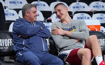 DENVER, CO - APRIL 16: MicahNori of the Minnesota Timberwolves talks with Nikola Jokic #15 of the Denver Nuggets before Round 1 Game 1 of the 2023 NBA Playoffs on April 16, 2023 at the Ball Arena in Denver, Colorado. NOTE TO USER: User expressly acknowledges and agrees that, by downloading and/or using this Photograph, user is consenting to the terms and conditions of the Getty Images License Agreement. Mandatory Copyright Notice: Copyright 2023 NBAE (Photo by Garrett Ellwood/NBAE via Getty Images)