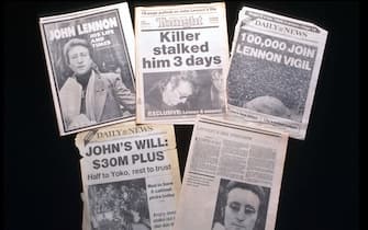 247144 01: The front pages of several newspapers are on display December 2, 1995 in New York City. The memorial to John Lennon in Central Park called, "Strawberry Fields" still continues to draw people who leave tributes to him. (Photo by Evan Agostini/Liaison)