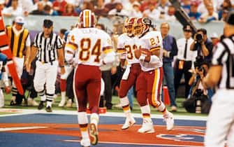 MINNEAPOLIS, MN - JANUARY 26: Running back Earnest Byner #21 of the Washington Redskins celebrates a touchdown with wide receiver Ricky Sanders #83 during Super Bowl XXVI against the Buffalo Bills on January 26, 1992 at the Hubert H. Humphrey Metrodome in Minneapolis, Minnesota. Washington won 37-24. (Photo by Rich Pilling/Diamond Images via Getty Images)