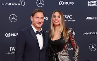 epa06569287 Former Italian soccer player Francesco Totti (L) and his wife Ilary Blasi (R) arrive at the 2018 Laureus World Sports Awards in Monaco, 27 February 2018. The annual Laureus Awards are held to honor people whom make a notable impact and remarkable accomplishments in the world of sport throughout the year.  EPA/SEBASTIEN NOGIER