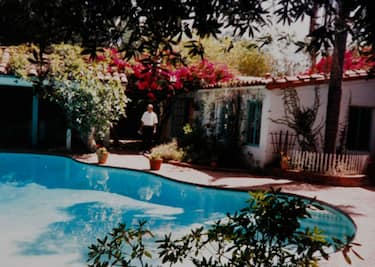 COPY SHOT: A photo o Marilyn Monroe's pool and backyard as it was when she owned the Brentwood home which is part of the collection of Greg Schreiner copy shot on July 13, 2010 at Schreiner's home in Los Angeles.The home where Marilyn Monroe died in Brentwood has been put on the market and Schreiner , a huge fan of Monroe, has photos from the house. He also has furniture from her home in an exhibit Marilyn Remembered at the Hollywood Museum.  (Photo by Anne Cusack/Los Angeles Times via Getty Images)