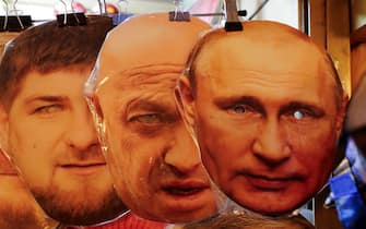 epaselect epa10712521 (L-R) Face masks depicting Chechen Republic's regional leader Ramzan Kadyrov, owner of PMC (Private Military Company)  Wagner Yevgeny Prigozhin and Russian President Vladimir Putin are displayed for sale at a souvenir market in St. Petersburg, Russia, 26 June 2023. On 24 June, counter-terrorism measures were enforced in Moscow and other Russian regions after private military company (PMC) Wagner Group chief Yevgeny Prigozhin claimed that his troops had occupied the building of the headquarters of the Southern Military District in Rostov-on-Don, demanding a meeting with Russia's defense chiefs. Belarusian President Lukashenko, a close ally of Putin, negotiated a deal with Wagner chief Prigozhin to stop the movement of the group's fighters across Russia, the press service of the President of Belarus reported. The negotiations were said to have lasted for the entire day. Prigozhin announced that Wagner fighters were turning their columns around and going back in the other direction, returning to their field camps.  EPA/ANATOLY MALTSEV