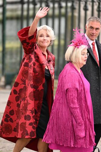 LONDON, ENGLAND - MAY 06: Dame Emma Thompson, guest and Greg Wise arrive at Westminster Abbey ahead of the Coronation of King Charles III and Queen Camilla on May 06, 2023 in London, England. The Coronation of Charles III and his wife, Camilla, as King and Queen of the United Kingdom of Great Britain and Northern Ireland, and the other Commonwealth realms takes place at Westminster Abbey today. Charles acceded to the throne on 8 September 2022, upon the death of his mother, Elizabeth II. (Photo by Jeff Spicer/Getty Images)