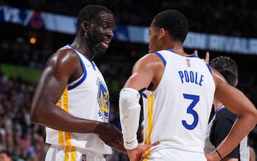 DENVER, CO - APRIL 24: Draymond Green #23 and Jordan Poole #3 of the Golden State Warriors talk during Round 1 Game 4 of the 2022 NBA Playoffs on April 24, 2022 at the Ball Arena in Denver, Colorado. NOTE TO USER: User expressly acknowledges and agrees that, by downloading and/or using this Photograph, user is consenting to the terms and conditions of the Getty Images License Agreement. Mandatory Copyright Notice: Copyright 2022 NBAE (Photo by Garrett Ellwood/NBAE via Getty Images)