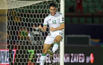 epa07688362 Adam Ounas of Algeria (C) celebrates goal during the 2019 Africa Cup of Nations match between Tanzania and Algeria in Cairo, Egypt, 01 July 2019.  EPA/Gavin Barker
