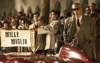 USA. Adam Driver in the (C)Neon new film: Ferrari (2023). 
Plot: Set in the summer of 1957, with Enzo Ferrari's auto empire in crisis, the ex-racer turned entrepreneur pushes himself and his drivers to the edge as they launch into the Mille Miglia, a treacherous 1,000-mile race across Italy.  
Ref: LMK106-J10340-011223
Supplied by LMKMEDIA. Editorial Only. Landmark Media is not the copyright owner of these Film or TV stills but provides a service only for recognised Media outlets. pictures@lmkmedia.com
