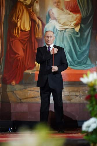 epa10575271 A handout photo made available by the Moscow and All Russia Partiarch Press Service shows Russian President Vladimir Putin attending the Orthodox Easter holiday service at the Christ the Saviour Cathedral in Moscow, Russia, 16 April 2023. Orthodox Christian believers mark the Holy Week of Easter in celebration of the crucifixion and resurrection of Jesus Christ. The Greek Orthodox world celebrates Easter Day according to the old Julian calendar.  EPA/OLEG VAROV / HANDOUT  HANDOUT EDITORIAL USE ONLY/NO SALES