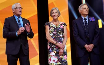 FAYETTEVILLE, AR - JUNE 1: Members of the Walton family (L-R) Rob, Alice and Jim speak during the annual Walmart shareholders meeting event on June 1, 2018 in Fayetteville, Arkansas. The shareholders week brings thousands of shareholders and associates from around the world to meet at the company's  global headquarters. (Photo by Rick T. Wilking/Getty Images)