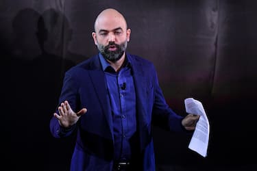 Italian writer Roberto Saviano performs on stage at the Ariston theatre during the 72nd Sanremo Italian Song Festival, Sanremo, Italy, 03 February 2022. The music festival runs from 01 to 05 February 2022. ANSA/ETTORE FERRARI