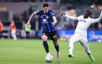 1.04.2024, Milan, Stadio Meazza, Serie A: Inter - Empoli,  #95 Alessandro Bastoni (Inter Milan, left) against #10 M'Baye Niang (FC Empoli, right) (Photo by Luigi Rizzo/Just Pictures/Sipa USA)