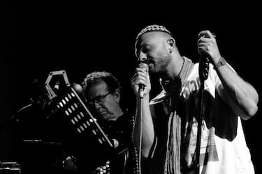 CIMITILE, ITALY - 2011/09/07: The singer Raiz, leader of neapolitan Almamegretta group and the accordionist Richard Galliano, during a concert at Pomigliano Jazz Festival. (Photo by Marco Cantile/LightRocket via Getty Images)