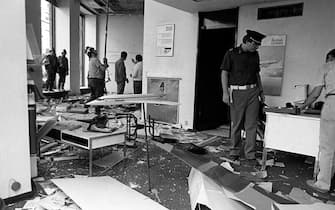 ROME, ITALY - SEPTEMBER 25: Terrorist attack on the offices of the British Airways airline in via Bissolati, with a suitcase bomb  exploded destroying the headquarters of the airline, immediately arrested the bomber is called Hasam Aatab is sixteen on Â Â September 25, 1985 in Rome,Italy. The attack was claimed by the Revolutionary Organization of Socialist Muslims (ORMS). The injured are three Italian employees of British Airways and another person believed to have been a customer. Another 10 people were reported injured, mostly by flying glass. (Photo by Stefano Montesi - Corbis/Getty Images)