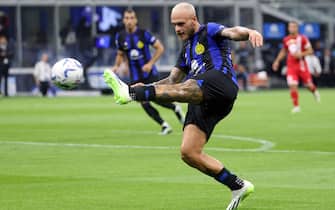 Inter Milan’s Federico Dimarco kicks during the Italian serie A soccer match between Fc Inter  and Monza Giuseppe Meazza stadium in Milan, 19 August 2023.ANSA / MATTEO BAZZI