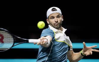 epa11158314 Grigor Dimitrov of Bulgaria in action against Alexander Shevchenko of Kazakhstan on the fifth day of the ABN AMRO Open tennis tournament at Ahoy indoor arena in Rotterdam, the Netherlands, 16 February 2024.  EPA/SANDER KONING