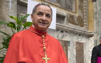 Substitute of the Vatican Secretary of State and Special Delegate for the Sovereign Military Order of Malta from Italy, Giovanni Angelo Becciu, poses for photographers after the Pope Francis' Ordinary Public Consistory to create 14 new cardinal from 11 countries in Saint Peters Basilica at the Vatican, 28 Jun 2018. The cardinals-designate are from Bolivia, Iraq, Italy, Japan, Pakistan, Poland, Portugal, Peru, Madagascar, Mexico and Spain. ANSA/CLAUDIO PERI