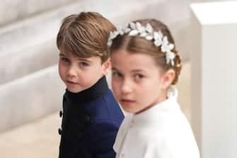 Britain's Princess Charlotte of Wales and Britain's Prince Louis of Wales arrive at Westminster Abbey in central London on May 6, 2023, ahead of the coronations of Britain's King Charles III and Britain's Camilla, Queen Consort. - The set-piece coronation is the first in Britain in 70 years, and only the second in history to be televised. Charles will be the 40th reigning monarch to be crowned at the central London church since King William I in 1066. Outside the UK, he is also king of 14 other Commonwealth countries, including Australia, Canada and New Zealand. Camilla, his second wife, will be crowned queen alongside him, and be known as Queen Camilla after the ceremony. (Photo by Dan CHARITY / POOL / AFP) (Photo by DAN CHARITY/POOL/AFP via Getty Images)