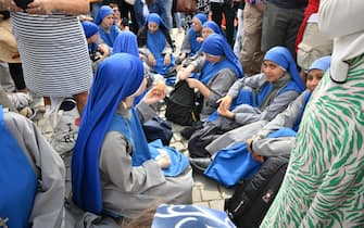 Nuns wait for Pope Leo XIV who will lead the Regina Coeli prayer from the central loggia of Saint Peter's Basilica at the Vatican City, 11 May 2025.
ANSA/ALESSANDRO DI MEO
