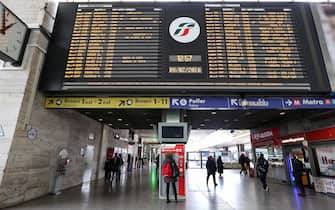 A traveler uses a Trenitalia SpA self-service ticket machine at Termini train station in Rome, Italy, on Tuesday, Feb. 9, 2016. The Poste Italiane IPO, which valued the company at about 8.8 billion euros, kicked off a round of state sales that will include air traffic controller Enav SpA and railway company Ferrovie dello Stato SpA, both planned for 2016. Photographer: Alessia Pierdomenico/Bloomberg via Getty Images