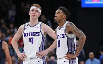 MEMPHIS, TENNESSEE - JANUARY 01: Kevin Huerter #9 and Malik Monk #0 of the Sacramento Kings during the game against the Memphis Grizzlies at FedExForum on January 01, 2023 in Memphis, Tennessee. NOTE TO USER: User expressly acknowledges and agrees that, by downloading and or using this photograph, User is consenting to the terms and conditions of the Getty Images License Agreement. (Photo by Justin Ford/Getty Images)