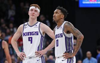 MEMPHIS, TENNESSEE - JANUARY 01: Kevin Huerter #9 and Malik Monk #0 of the Sacramento Kings during the game against the Memphis Grizzlies at FedExForum on January 01, 2023 in Memphis, Tennessee. NOTE TO USER: User expressly acknowledges and agrees that, by downloading and or using this photograph, User is consenting to the terms and conditions of the Getty Images License Agreement. (Photo by Justin Ford/Getty Images)
