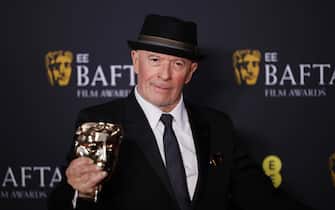 epa11901865 French director Jacques Audiard poses in the press room after winning the Best Film Not in the English Language award for 'Emilia Perez' during the BAFTA Film Awards at the Royal Festival Hall in London, Britain, 16 February 2025. The ceremony is hosted by the British Academy of Film and Television Arts (BAFTA).  EPA/TOLGA AKMEN