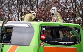 27 March 2024, Saxony, Schkeuditz: Firefighters inspect a coach at the scene of an accident on the A9. At least five people have died in an accident involving a coach on the A9 near Leipzig. This was announced by the police on request. There were also numerous injuries in the accident on Wednesday. Photo: Jan Woitas/dpa (Photo by Jan Woitas/picture alliance via Getty Images)