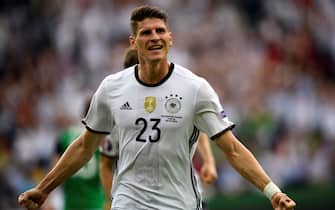Germany's forward Mario Gomez celebrates scoring the opening goal during the Euro 2016 group C football match between Northern Ireland and Germany at the Parc des Princes stadium in Paris on June 21, 2016. / AFP / LIONEL BONAVENTURE        (Photo credit should read LIONEL BONAVENTURE/AFP/Getty Images)