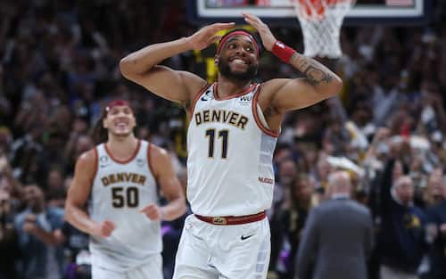 DENVER, COLORADO - JUNE 12: Bruce Brown #11 and Aaron Gordon #50 of the Denver Nuggets celebrate after a 94-89 victory against the Miami Heat in Game Five of the 2023 NBA Finals at Ball Arena on June 12, 2023 in Denver, Colorado. NOTE TO USER: User expressly acknowledges and agrees that, by downloading and or using this photograph, User is consenting to the terms and conditions of the Getty Images License Agreement. (Photo by Matthew Stockman/Getty Images)